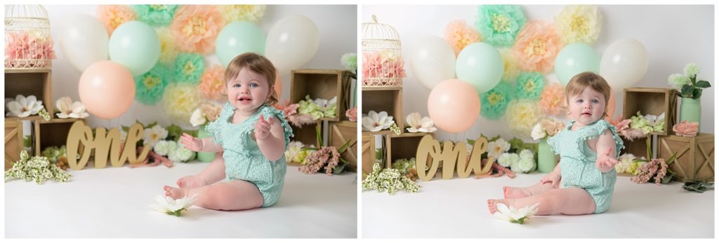 One year old girl with peach and mint decorations
