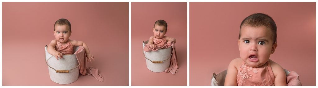 Baby girl in bucket for six month session