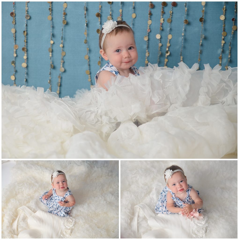 one year old in moms wedding dress