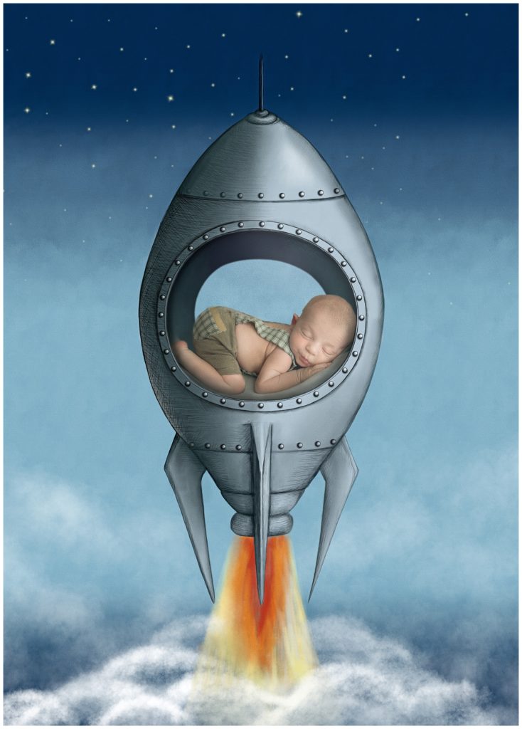 newborn boy on rocket ship