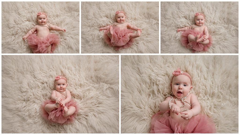 six month old girl in a tutu with pearls