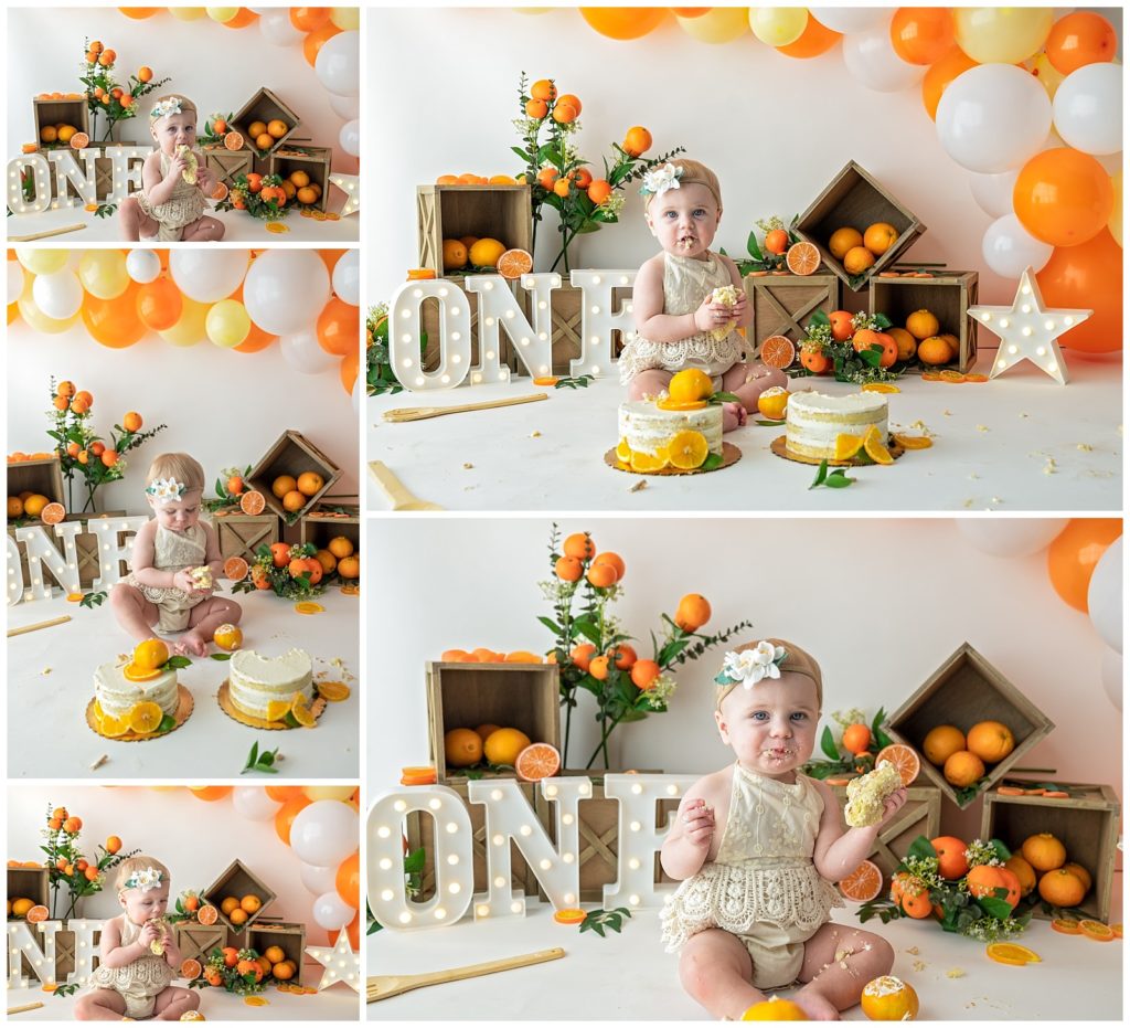 baby girl first birthday photo session with cake