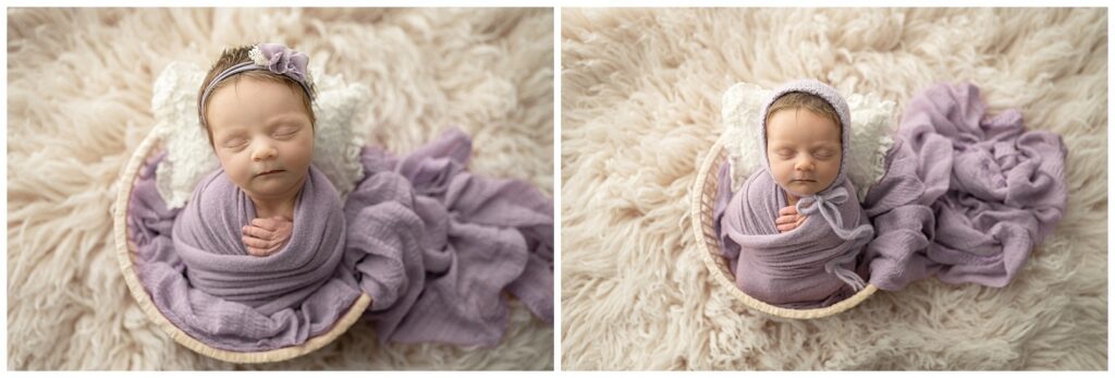 baby girl in purple swaddle wrap in a basket on top of a cream flokati rug