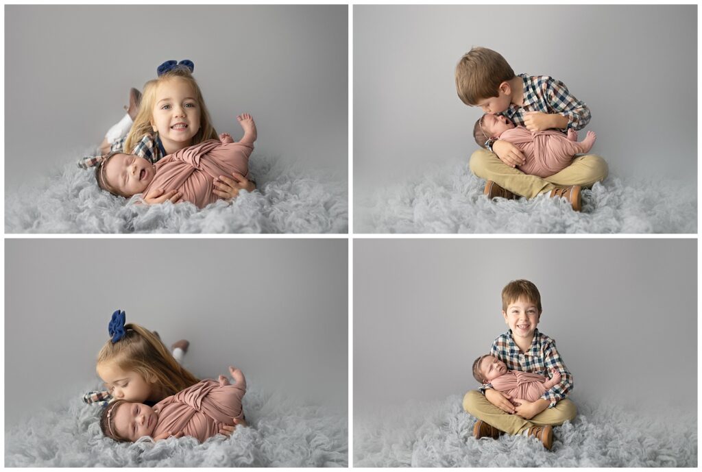 siblings with newborn baby sister on grey flokati and grey background