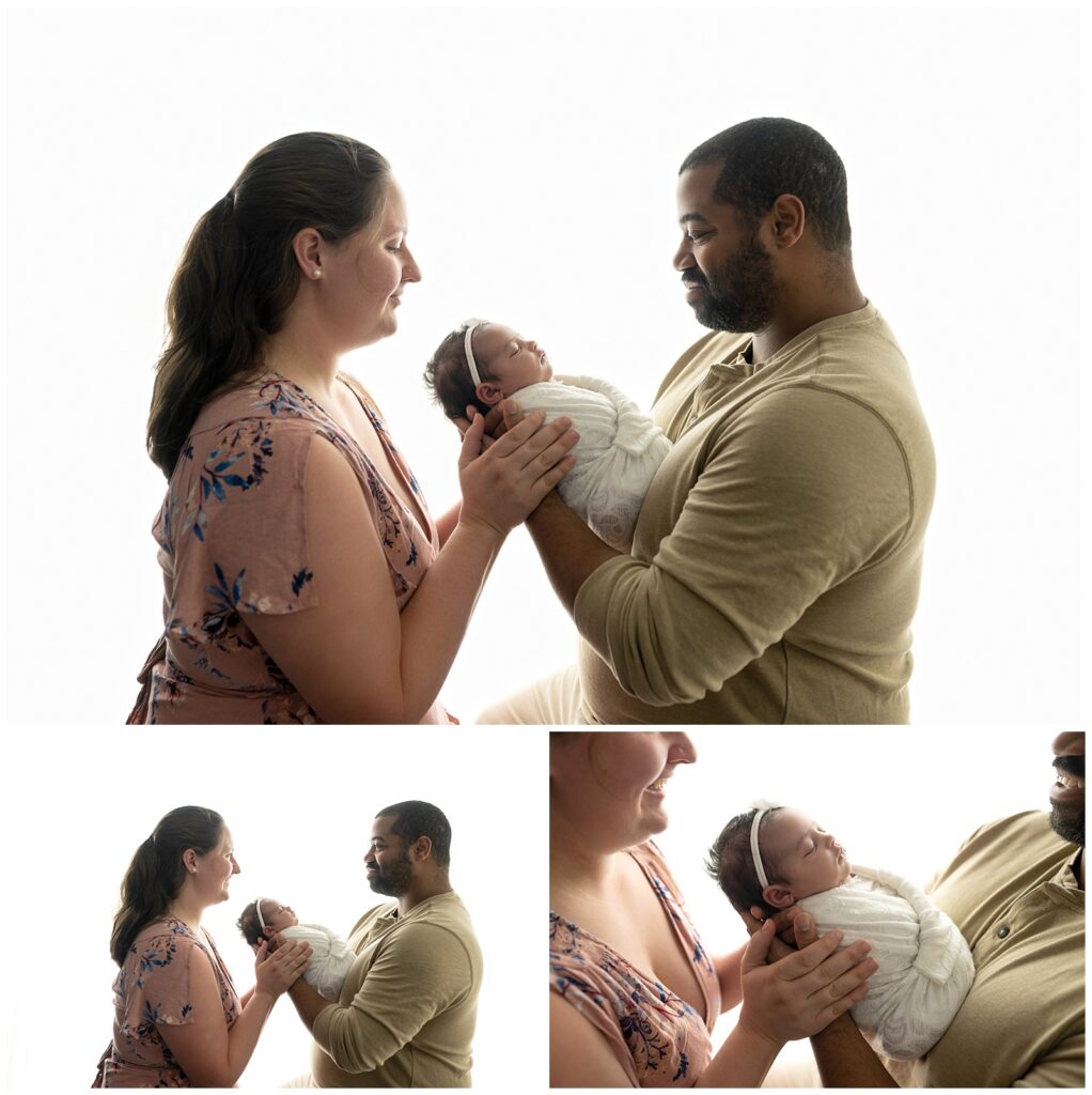 backlit newborn parent poses